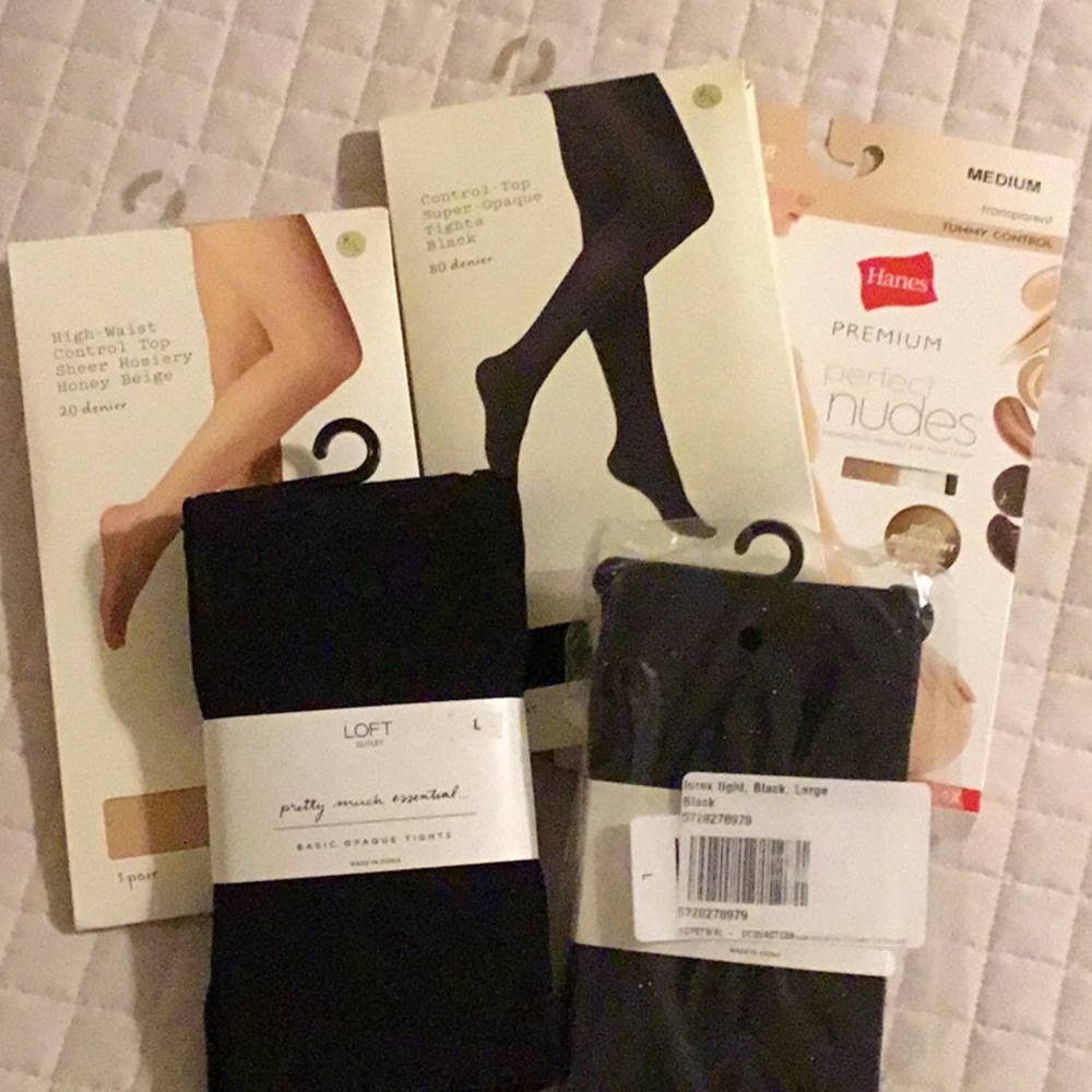 5 pairs of tights/stockings. 3 black 2 nude. In package.